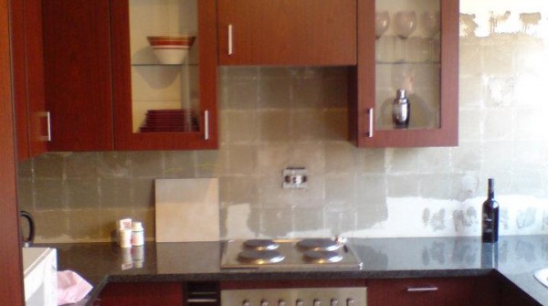 Mottled mahogany melamine kitchen